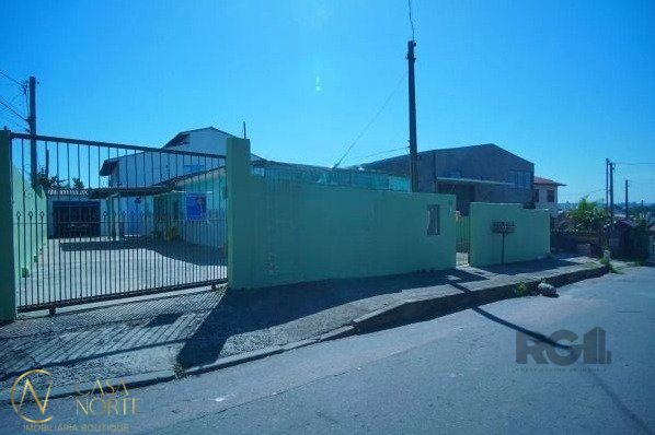 Casa à venda com 4 quartos, 182m², 1 suíte, 3 vagas, Rua Inácio Kohler no bairro Costa e Silva em Porto Alegre
