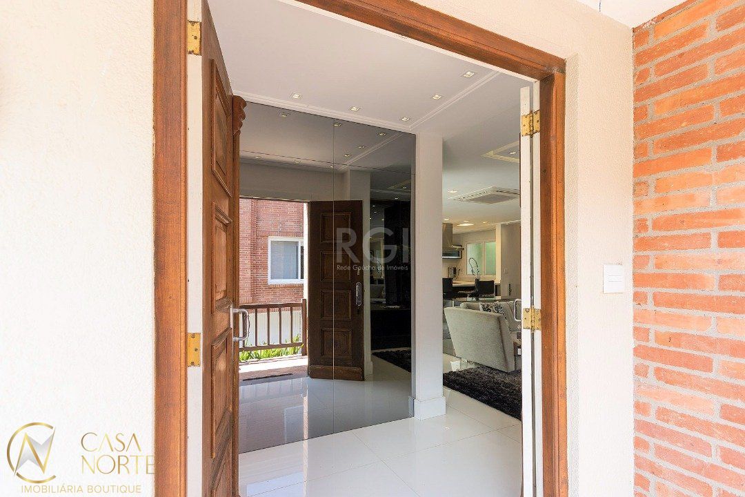 Casa de Condomínio à venda com 3 quartos, 353m², 3 suítes, 4 vagas, Avenida Coronel Marcos no bairro Pedra Redonda em Porto Alegre