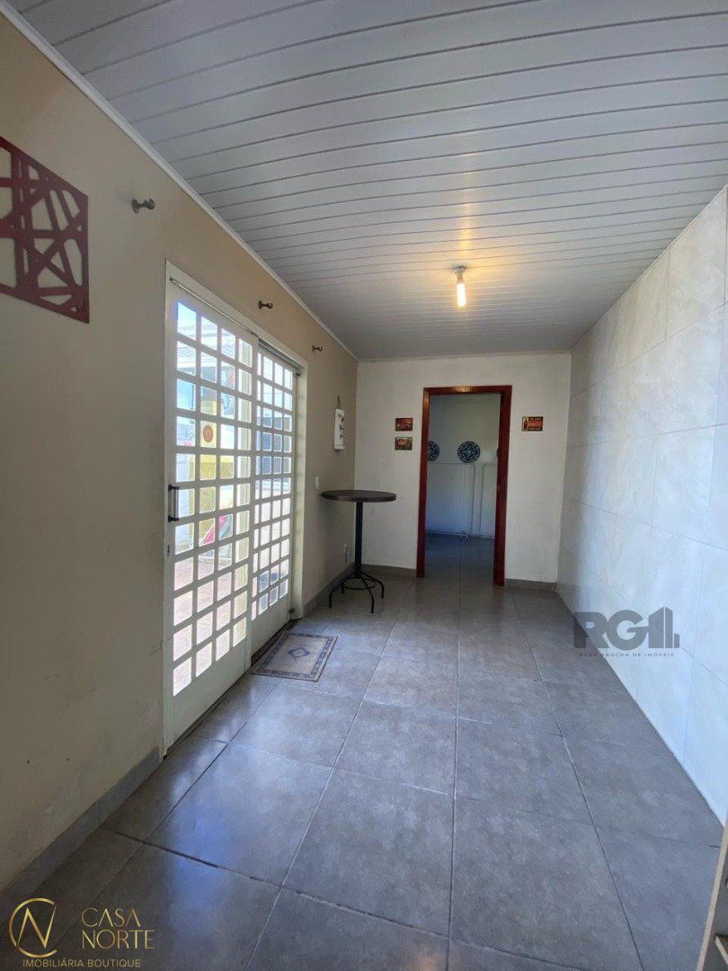 Casa à venda com 3 quartos, 89m², 1 suíte, 2 vagas, Rua Ruth Totta no bairro Hípica em Porto Alegre