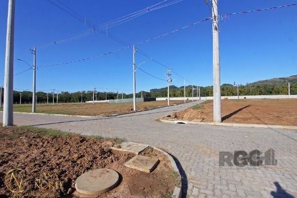 Terreno à venda  com 388m², Estrada Jorge Pereira Nunes no bairro Campo Novo em Porto Alegre