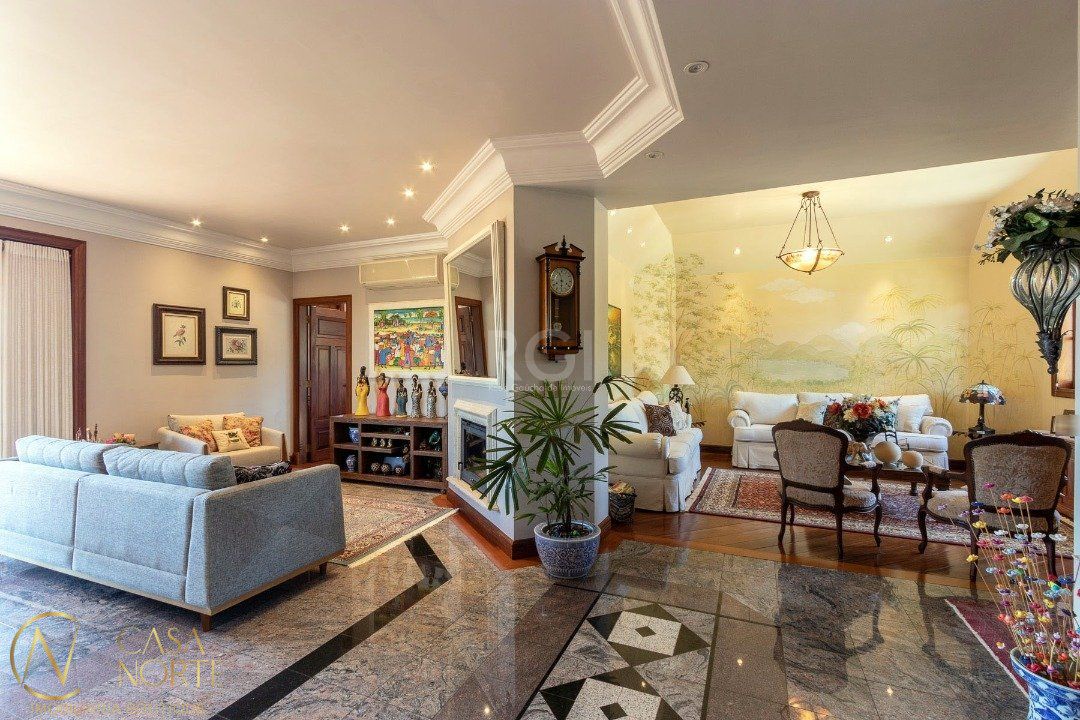 Casa de Condomínio à venda com 4 quartos, 559m², 3 suítes, 3 vagas, Avenida Firmino Octavio Bimbi no bairro Cavalhada em Porto Alegre
