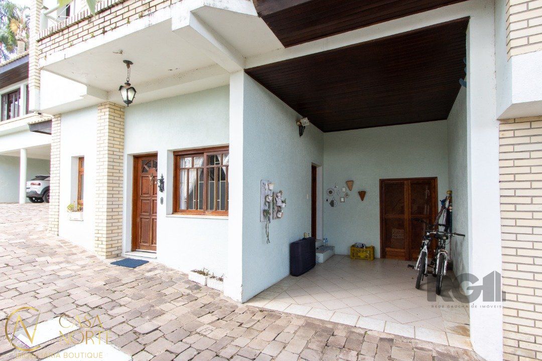 Casa de Condomínio à venda com 3 quartos, 225m², 1 suíte, 2 vagas, Rua João Mendes Ouriques no bairro Jardim Isabel em Porto Alegre