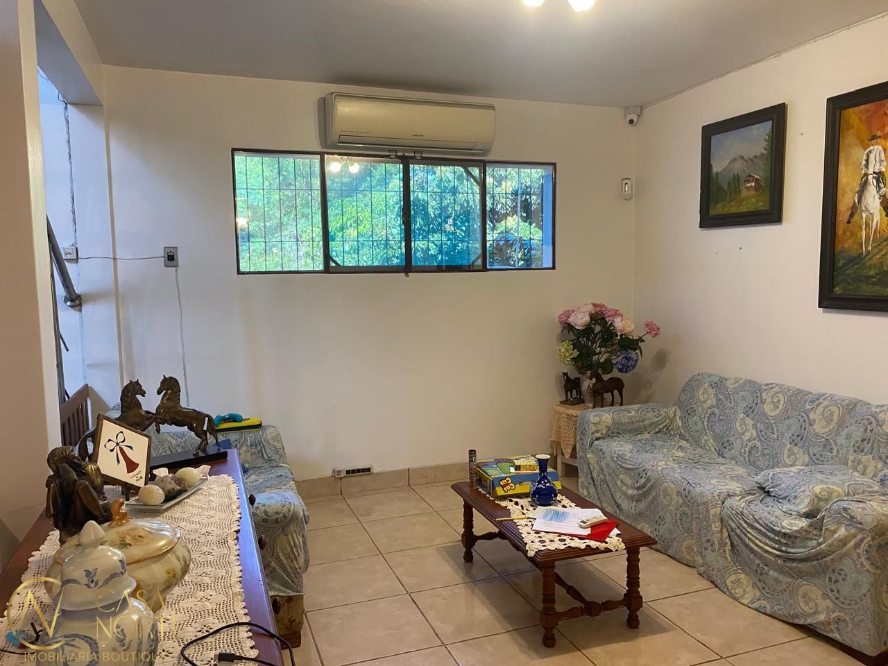 Casa à venda com 3 quartos, 243m², 1 suíte, 3 vagas, Estrada João Passuelo no bairro Vila Nova em Porto Alegre