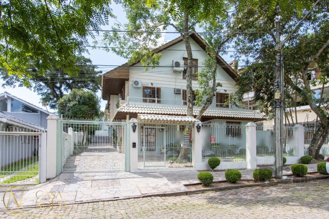 Casa de Condomínio à venda com 3 quartos, 225m², 1 suíte, 2 vagas, Rua João Mendes Ouriques no bairro Jardim Isabel em Porto Alegre