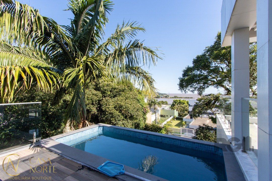 Casa à venda com 2 quartos, 430m², 2 suítes, 5 vagas, Rua Doutor Possidônio Cunha no bairro Vila Assunção em Porto Alegre
