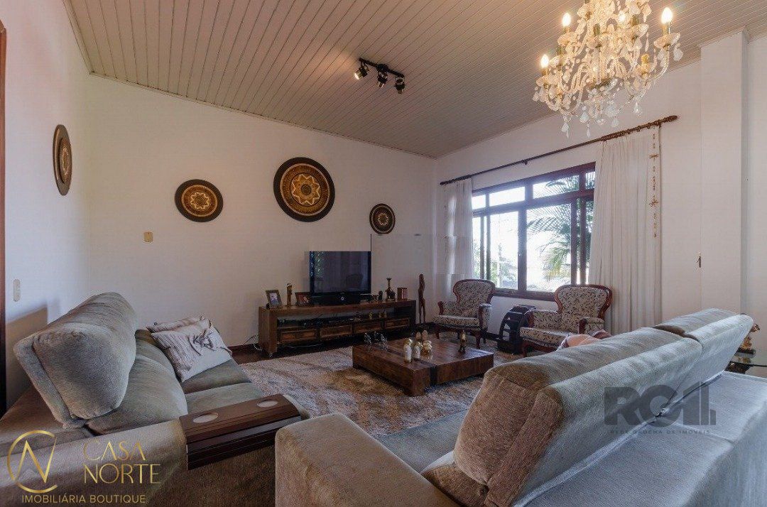 Casa de Condomínio à venda com 3 quartos, 450m², 1 suíte, 3 vagas, Avenida Firmino Octavio Bimbi no bairro Cavalhada em Porto Alegre