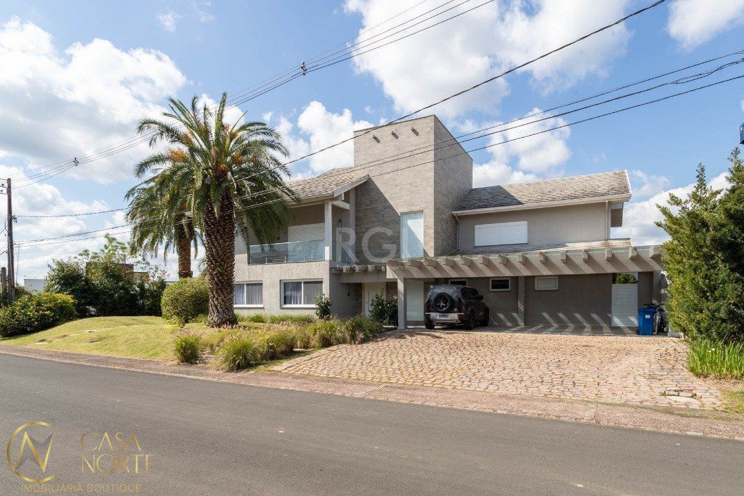 Casa de Condomínio à venda com 4 quartos, 587m², 4 suítes, 10 vagas, Avenida Juca Batista no bairro Chapéu do Sol em Porto Alegre
