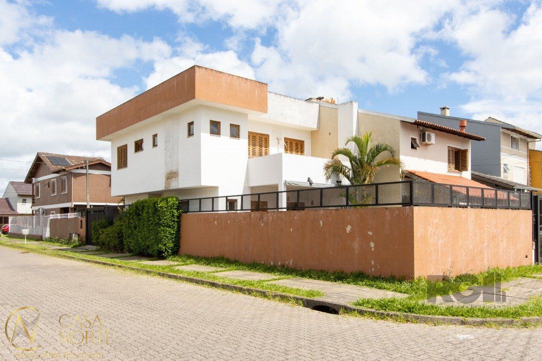 Casa à venda com 4 quartos, 140m², 1 suíte, 2 vagas, Rua Professora Doutora Hebe Tourinho no bairro Aberta dos Morros em Porto Alegre