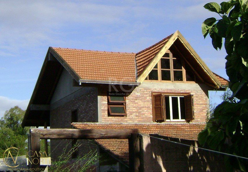 Casa à venda com 3 quartos, 130m², 1 suíte, 3 vagas, Rua Tapera no bairro Hípica em Porto Alegre
