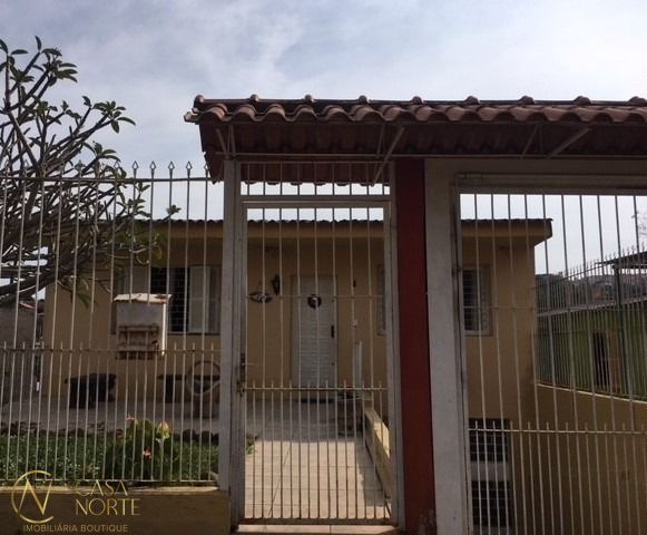 Casa à venda com 4 quartos, 150m², 2 vagas, Avenida Quarai no bairro Nonoai em Porto Alegre