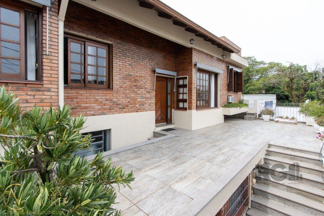Casa à venda com 3 quartos, 222m², 1 suíte, 2 vagas, Rua Banco Ingles no bairro Santa Tereza em Porto Alegre