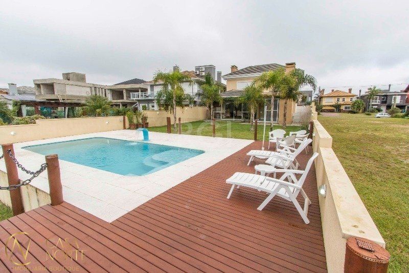 Casa de Condomínio à venda com 4 quartos, 320m², 4 suítes, 4 vagas, Avenida Juca Batista no bairro Belém Novo em Porto Alegre