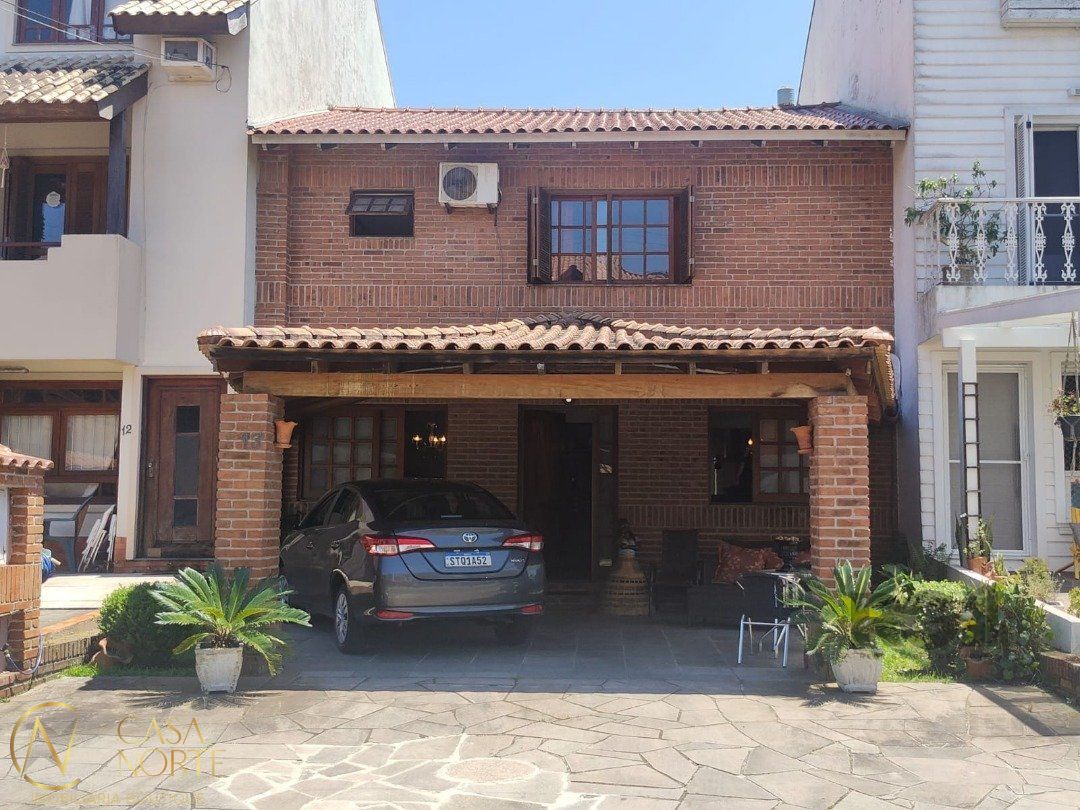 Casa de Condomínio à venda com 3 quartos, 248m², 1 suíte, 2 vagas, Avenida Juca Batista no bairro Cavalhada em Porto Alegre