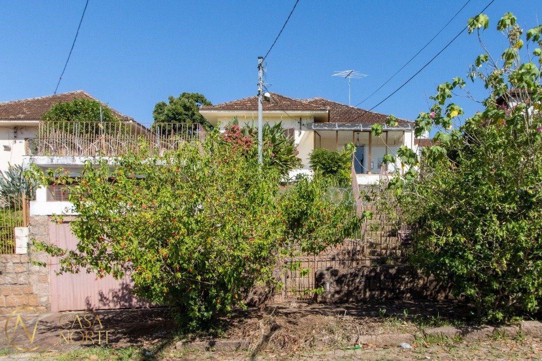 Casa à venda com 2 quartos, 400m², 1 vaga, Rua Oscar Tollens no bairro Santa Tereza em Porto Alegre