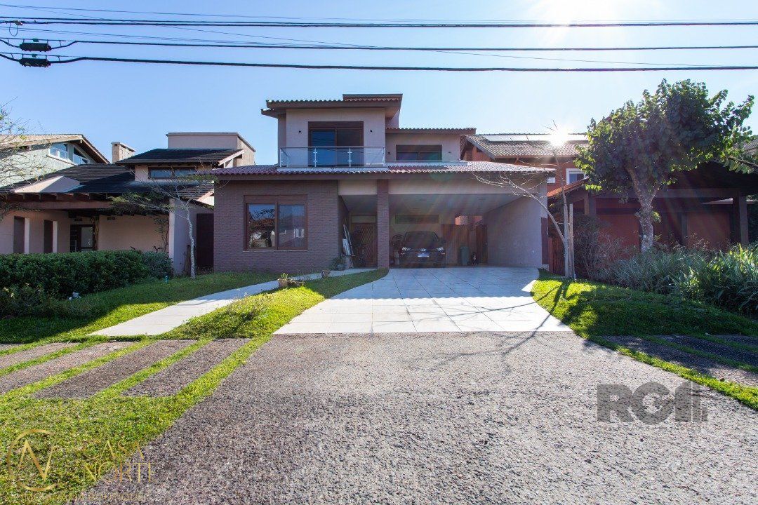 Casa de Condomínio à venda com 4 quartos, 226m², 4 suítes, 2 vagas, Avenida Juca Batista no bairro Belém Novo em Porto Alegre