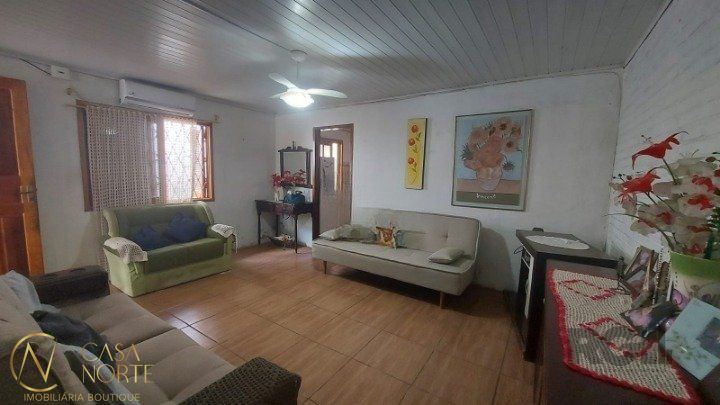 Casa à venda com 2 quartos, 100m², 1 vaga, Rua São Sebastião do Cai no bairro Camaquã em Porto Alegre