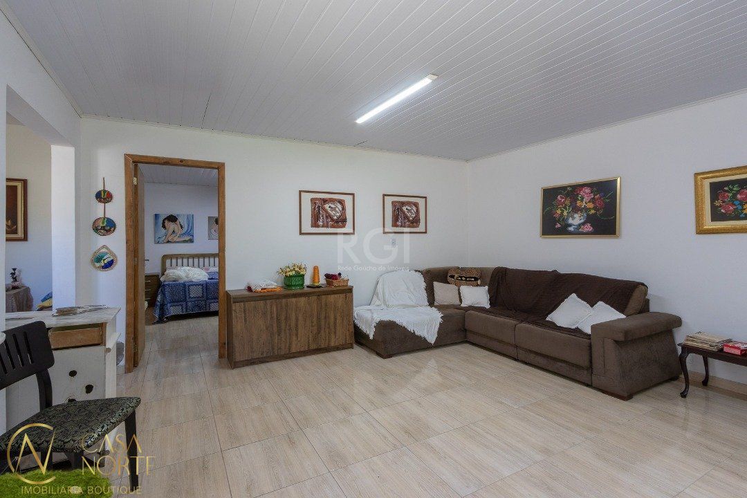 Casa à venda com 4 quartos, 370m², 1 suíte, 6 vagas, Estrada Afonso Lourenco Mariante no bairro Lomba do Pinheiro em Porto Alegre