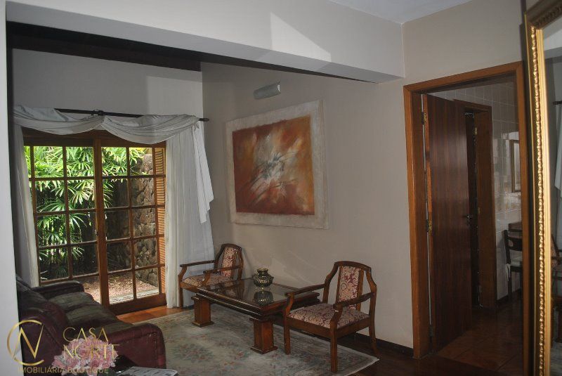 Casa de Condomínio à venda com 4 quartos, 550m², 4 suítes, 2 vagas, Avenida da Cavalhada no bairro Cavalhada em Porto Alegre