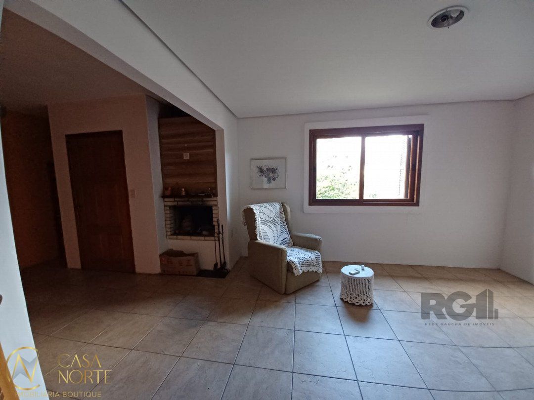Casa à venda com 3 quartos, 144m², 2 vagas, Estrada João Passuelo no bairro Vila Nova em Porto Alegre