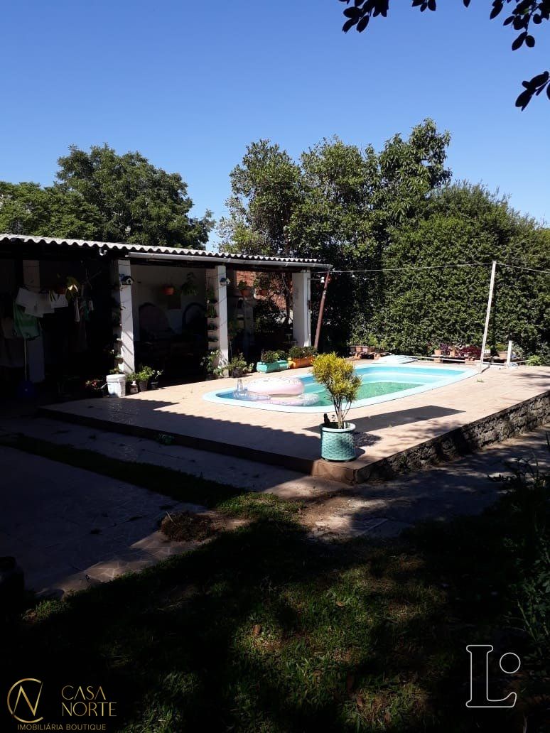 Casa à venda com 3 quartos, 150m², Rua Pedro Rodrigues Bittencourt no bairro Vila Nova em Porto Alegre