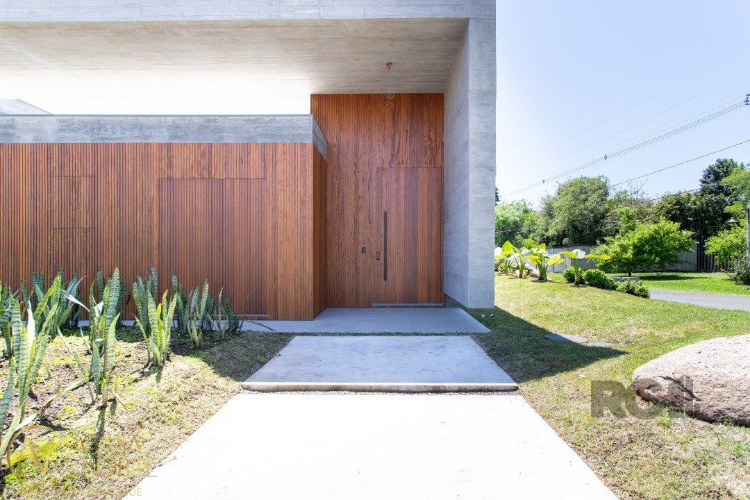 Casa de Condomínio à venda com 4 quartos, 389m², 4 suítes, 4 vagas, Avenida Juca Batista no bairro Belém Novo em Porto Alegre