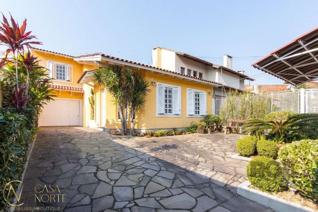 Casa à venda com 4 quartos, 285m², 3 suítes, 5 vagas, Rua Paulo Derly Strehl no bairro Espírito Santo em Porto Alegre