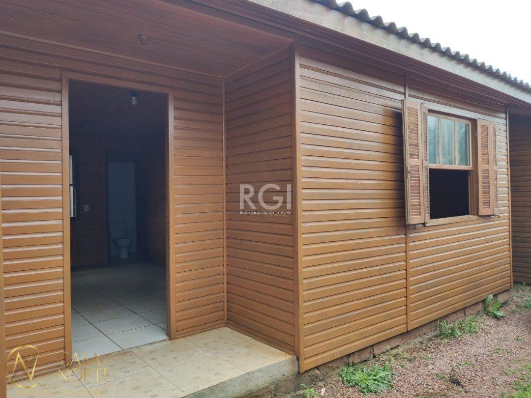 Casa à venda com 2 quartos, 43m², 3 vagas, Rua Casemiro de Souza no bairro Vila Nova em Porto Alegre