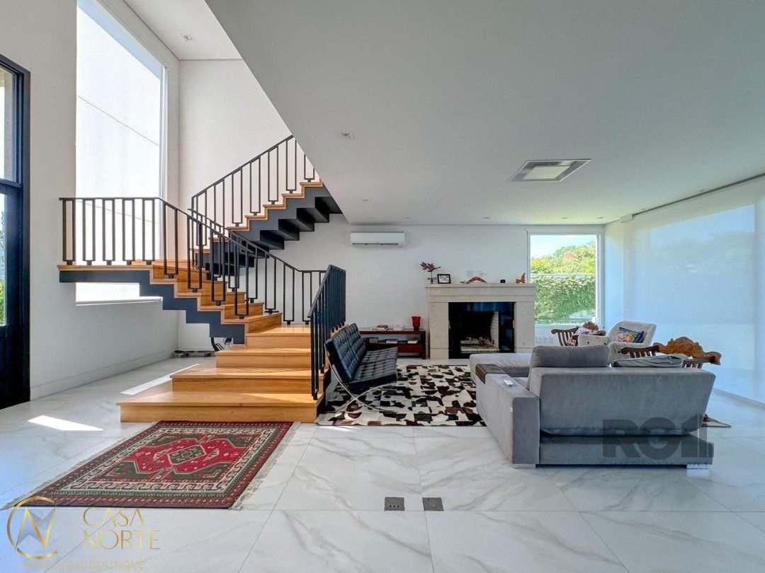 Casa de Condomínio à venda com 3 quartos, 314m², 3 suítes, 6 vagas, Avenida Juca Batista no bairro Belém Novo em Porto Alegre