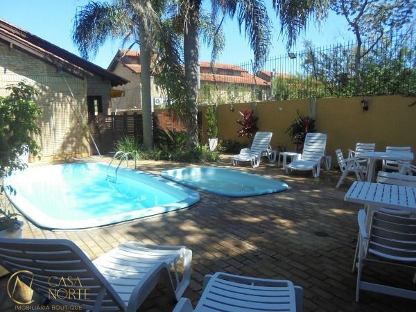 Casa de Condomínio à venda com 3 quartos, 121m², 1 suíte, 2 vagas, Rua Hubert Otto Krause no bairro Aberta dos Morros em Porto Alegre