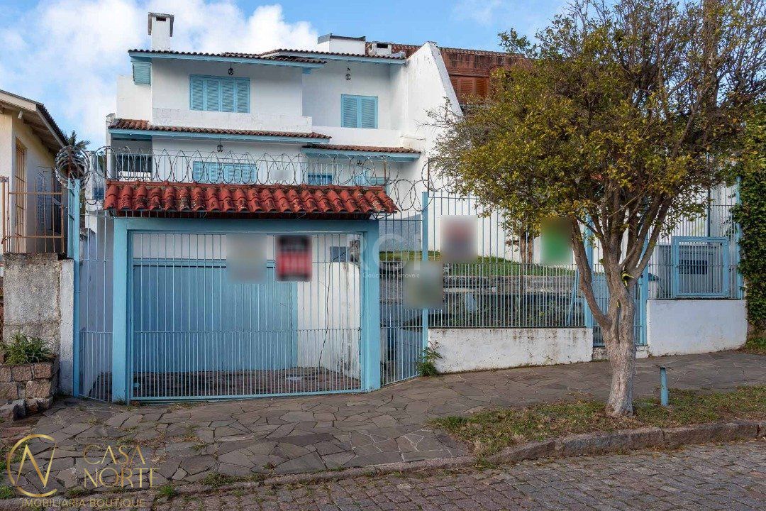 Casa à venda com 4 quartos, 266m², 1 suíte, 3 vagas, Rua Padre João Batista Reus no bairro Vila Conceição em Porto Alegre