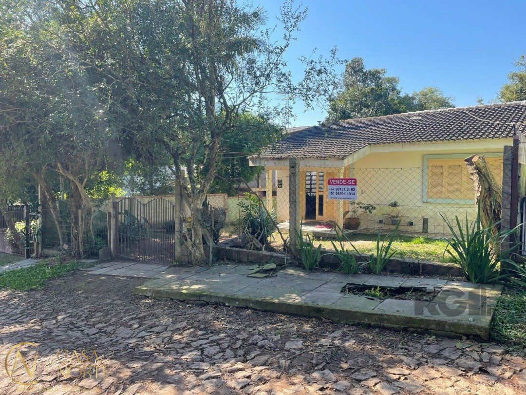 Casa à venda com 6 quartos, 200m², Rua Hygino Russi Lima no bairro Ponta Grossa em Porto Alegre