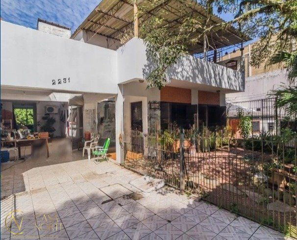 Casa à venda com 5 quartos, 274m², 1 suíte, 3 vagas, Avenida Vicente Monteggia no bairro Cavalhada em Porto Alegre