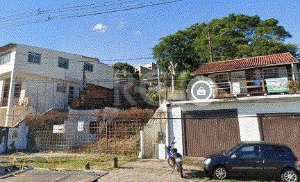 Terreno à venda  com 620m², Avenida Vicente Monteggia no bairro Cavalhada em Porto Alegre