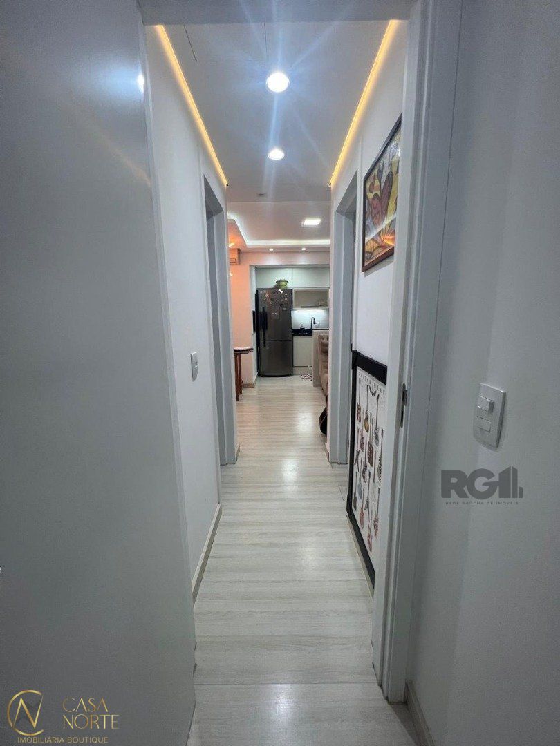 Apartamento à venda com 2 quartos, 57m², 1 suíte, 1 vaga, Rua Walton Pontes Carpes no bairro Vila Nova em Porto Alegre