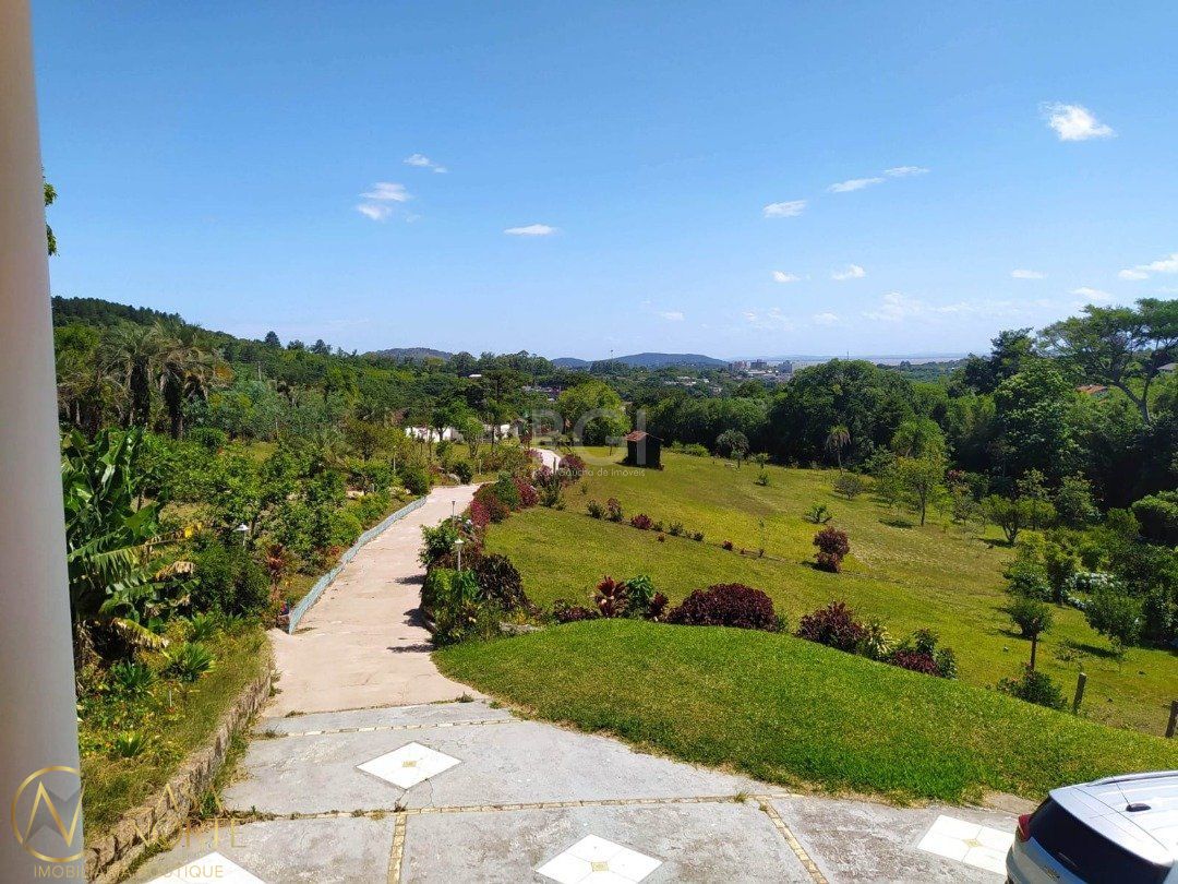 Sítio à venda com 4 quartos, 329m², 16 vagas, Estrada das Furnas no bairro Vila Nova em Porto Alegre