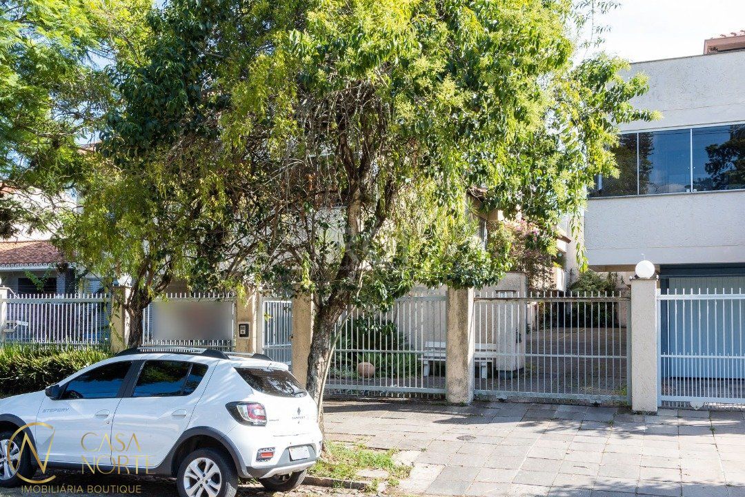 Casa de Condomínio à venda com 3 quartos, 196m², 1 suíte, 2 vagas, Avenida Pereira Passos no bairro Vila Assunção em Porto Alegre