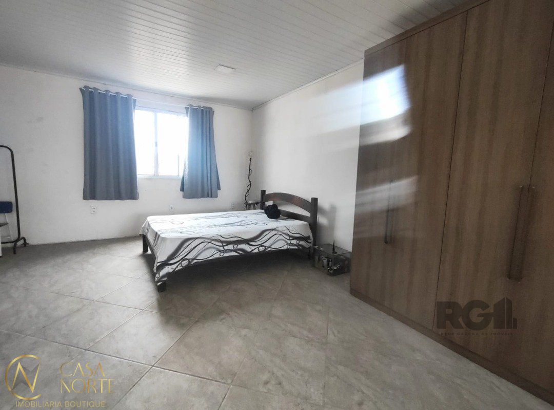 Casa à venda com 3 quartos, 195m², 1 suíte, 1 vaga, Rua Germano Bonow Filho no bairro Hípica em Porto Alegre