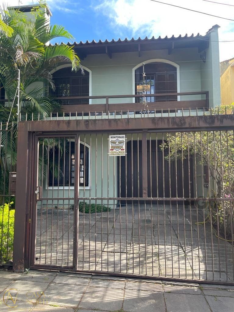 Casa à venda com 5 quartos, 300m², 3 suítes, 2 vagas, Rua Menezes Paredes no bairro Nonoai em Porto Alegre