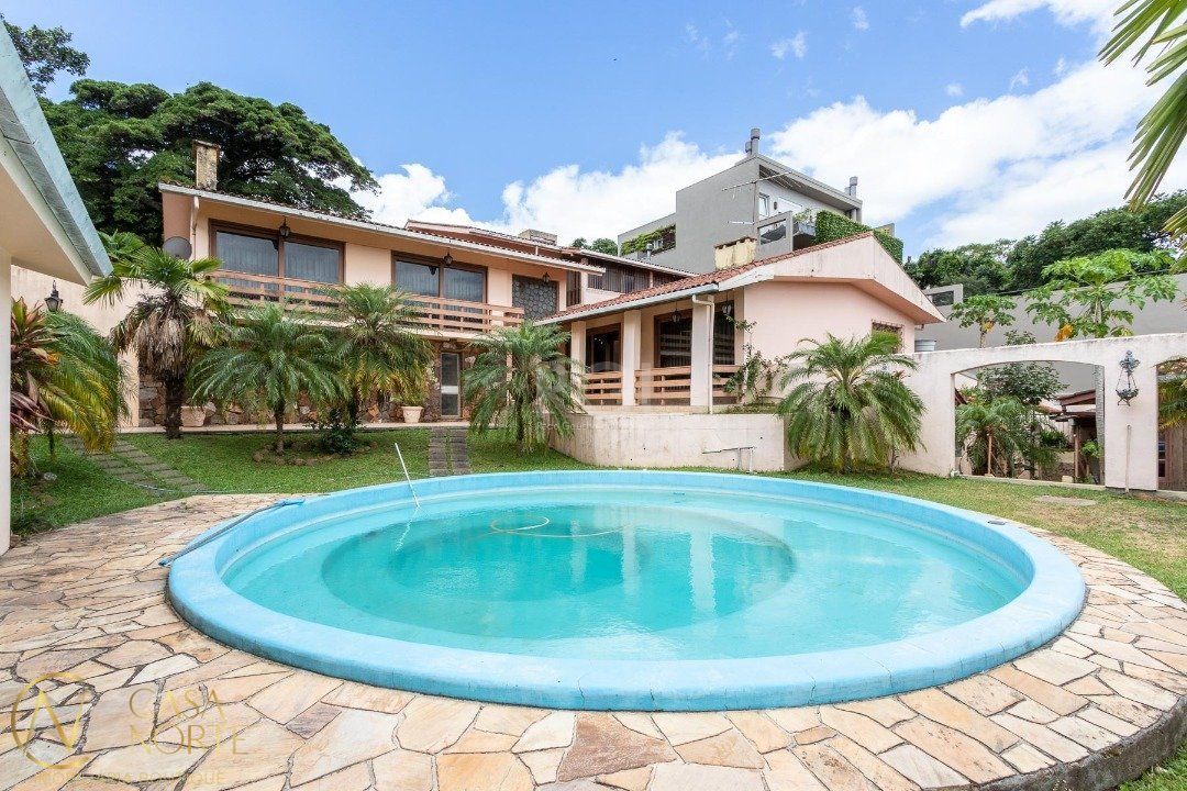 Casa à venda com 5 quartos, 1125m², 5 suítes, 5 vagas, Avenida Arlindo Pasqualini no bairro Jardim Isabel em Porto Alegre