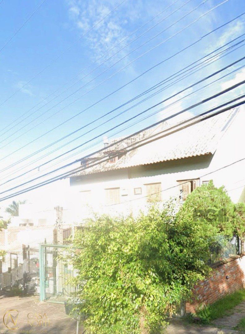 Casa à venda com 3 quartos, 231m², 1 suíte, 3 vagas, Rua Doutor Pitrez no bairro Ipanema em Porto Alegre