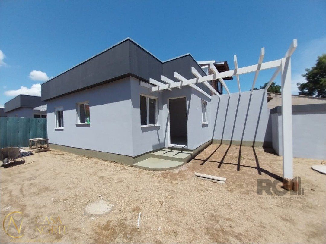 Casa à venda com 2 quartos, 91m², 1 vaga, Rua Jorge Mello Guimarães no bairro Belém Novo em Porto Alegre