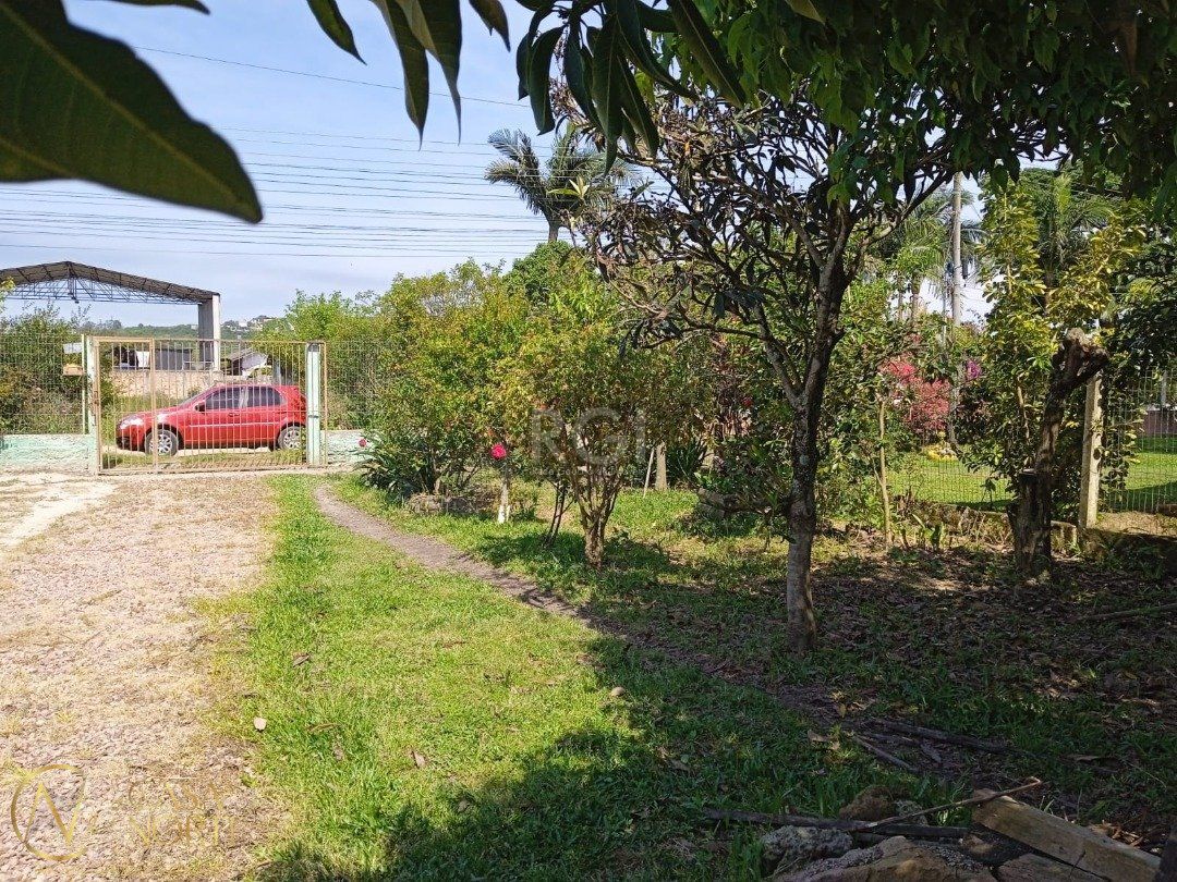 Casa à venda com 2 quartos, 72m², 2 suítes, Rua Oito Mil e Treze no bairro Lageado em Porto Alegre