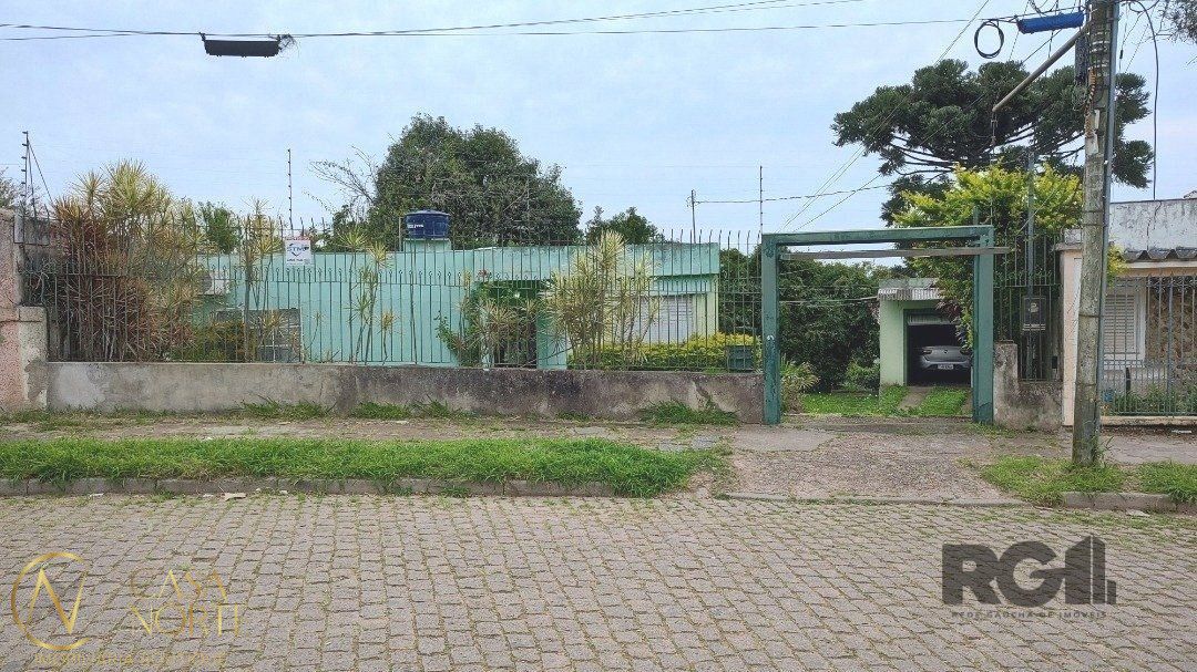 Casa à venda com 3 quartos, 148m², 4 vagas, Rua Rubens Alcantara no bairro Santa Tereza em Porto Alegre