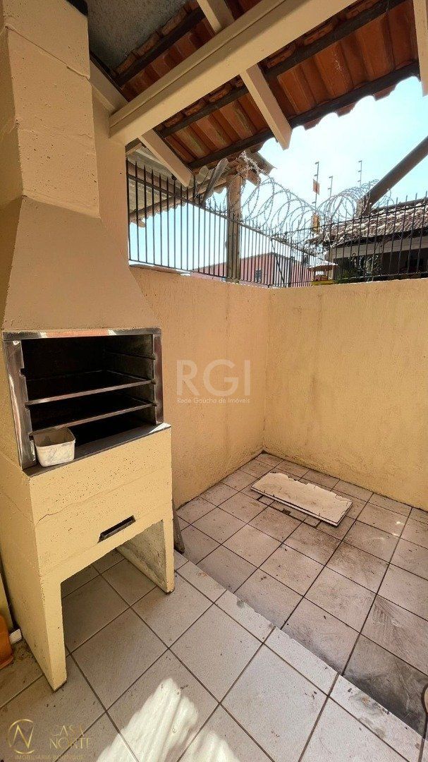 Casa de Condomínio à venda com 2 quartos, 94m², 1 suíte, 1 vaga, Rua Afonso Arinos no bairro Camaquã em Porto Alegre
