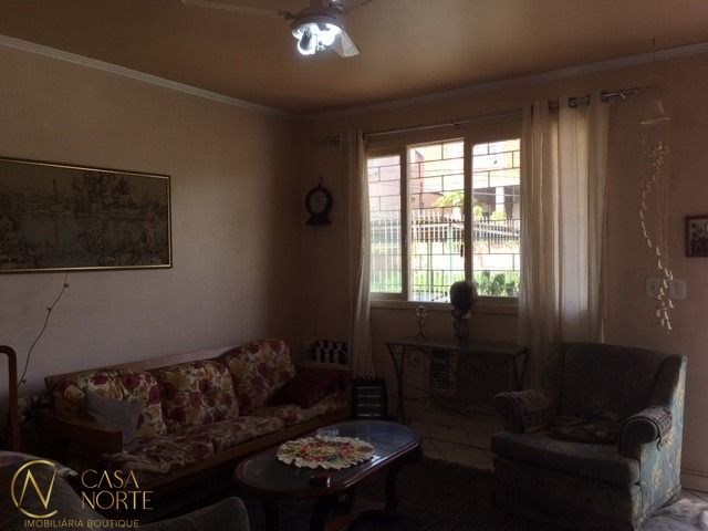 Casa à venda com 4 quartos, 150m², 2 vagas, Avenida Quarai no bairro Nonoai em Porto Alegre