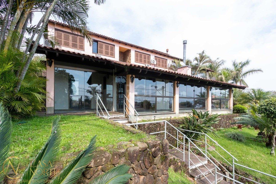 Casa à venda com 4 quartos, 500m², 1 suíte, 4 vagas, Rua Simao Bolivar no bairro Vila Conceição em Porto Alegre