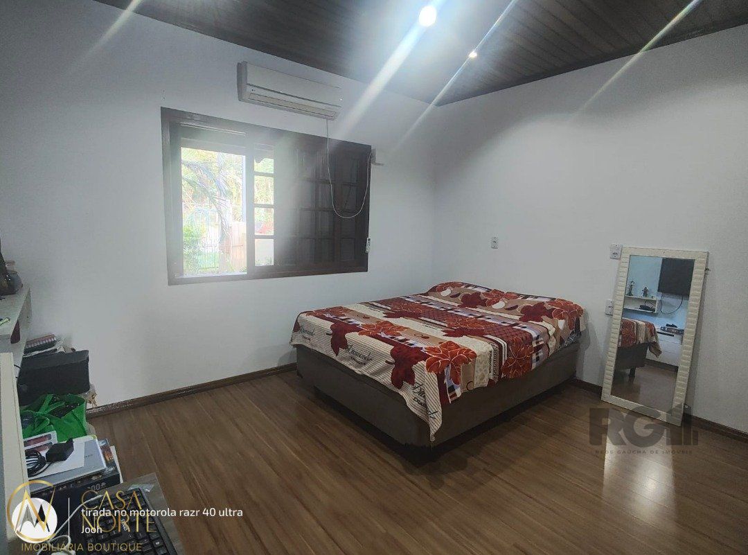 Casa à venda com 2 quartos, 120m², 3 vagas, Rua Maria da Cunha Koller no bairro Belém Novo em Porto Alegre