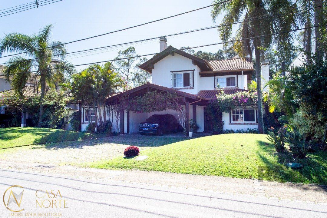 Casa de Condomínio à venda com 4 quartos, 321m², 4 suítes, 6 vagas, Avenida Juca Batista no bairro Chapéu do Sol em Porto Alegre