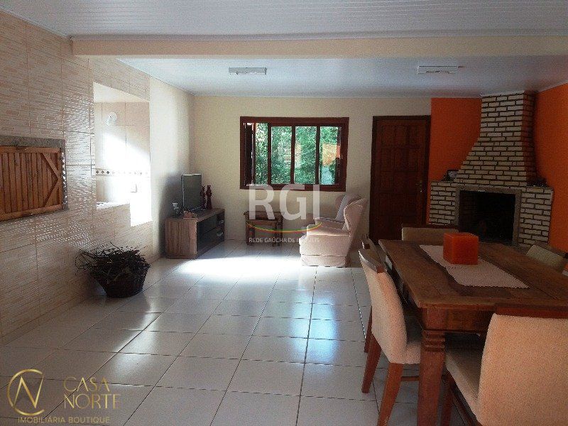 Casa à venda com 5 quartos, 250m², 3 suítes, 2 vagas, Rua Gavea no bairro Ipanema em Porto Alegre