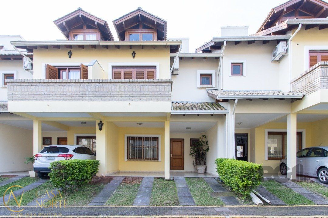 Casa de Condomínio à venda com 3 quartos, 192m², 1 suíte, 2 vagas, Avenida Eduardo Prado no bairro Cavalhada em Porto Alegre